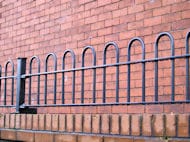 Iron Railings on Top of Wall